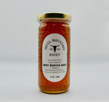 Load image into Gallery viewer, 12 oz. honeycomb style jar with our Sourwood honey.
